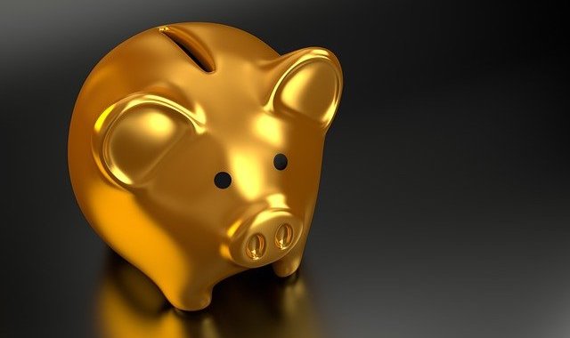 A piggy bank painted gold to symbolize wealth and savings