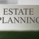 A file folder with a tab that says "Estate Planning"